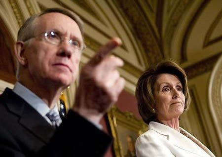 Sen. Harry Reid pointing finger. Rep. Nancy Pelosi standing by.